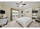 This bedroom features a built-in murphy bed, ceiling fan, and open shelving for storage at 2213 Hartwell Ln # 84, Indian Land, SC 29707