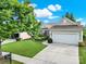 Charming single-Gathering home with a well-manicured lawn, two-car garage, and beautiful landscaping at 2213 Hartwell Ln # 84, Indian Land, SC 29707