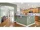 Kitchen with breakfast bar and an open floor plan with views to the entry and living spaces at 2213 Hartwell Ln # 84, Indian Land, SC 29707