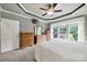 Comfortable main bedroom featuring carpet, large windows and ample dresser space at 2213 Hartwell Ln # 84, Indian Land, SC 29707