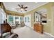 Bright sunroom filled with natural light, neutral carpet, multiple windows and views of the property at 2213 Hartwell Ln # 84, Indian Land, SC 29707
