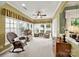 Bright sunroom with neutral carpet and many windows, which is perfect for relaxation and enjoying the property views at 2213 Hartwell Ln # 84, Indian Land, SC 29707