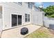 Charming backyard with a small patio and privacy fence at 230 Dawn Mist Ln, Fort Mill, SC 29708