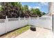 Enclosed backyard with white lattice fencing and a cozy patio area, perfect for outdoor enjoyment at 230 Dawn Mist Ln, Fort Mill, SC 29708
