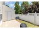 Charming backyard with a small patio and privacy fence at 230 Dawn Mist Ln, Fort Mill, SC 29708