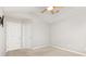Bright bedroom featuring neutral paint, ceiling fan, and closet for ample storage at 230 Dawn Mist Ln, Fort Mill, SC 29708