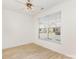 Bright bedroom with wood-look floors, a ceiling fan and a large window with blinds at 230 Dawn Mist Ln, Fort Mill, SC 29708