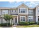 Charming townhome exterior with stone accents, tidy landscaping, and a welcoming entrance at 230 Dawn Mist Ln, Fort Mill, SC 29708