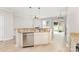 Kitchen with stainless steel dishwasher, sink and faucet, and breakfast bar overlooking the living area at 230 Dawn Mist Ln, Fort Mill, SC 29708