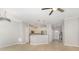 Kitchen featuring stainless steel appliances, a breakfast bar, and views into the living area at 230 Dawn Mist Ln, Fort Mill, SC 29708