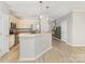 Open kitchen with stainless steel appliances and a breakfast bar perfect for entertaining at 230 Dawn Mist Ln, Fort Mill, SC 29708