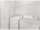 Laundry area equipped with a washer and dryer for convenient chores at 230 Dawn Mist Ln, Fort Mill, SC 29708
