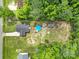 Aerial view of property with pool, sheds, wooded area and yard at 2302 Douglas Rd, Lancaster, SC 29720