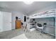 Neutral bedroom featuring a loft bed with built in desk and gray walls at 2302 Douglas Rd, Lancaster, SC 29720
