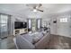 Comfortable living room with hardwood floors, a stylish sectional sofa, and plenty of natural light at 2302 Douglas Rd, Lancaster, SC 29720