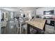 Open-concept layout showcasing the dining area and cozy living room with workspace setup at 2302 Douglas Rd, Lancaster, SC 29720