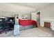 Upstairs bedroom featuring gray walls and non-working brick chimney at 238 N Depot St, Albemarle, NC 28001