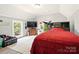 Large upstairs bedroom with bright light and gray walls and white ceilings at 238 N Depot St, Albemarle, NC 28001