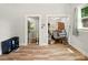 Hallway featuring hardwood floors with views into other rooms of the house at 238 N Depot St, Albemarle, NC 28001