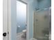 Modern bathroom with shower, toilet, and sleek design at 240 Hillcrest Dr, Harrisburg, NC 28075