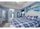 Bright main bedroom with ensuite bathroom and large windows at 240 Hillcrest Dr, Harrisburg, NC 28075