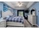 Bright main bedroom with tray ceiling and large windows at 240 Hillcrest Dr, Harrisburg, NC 28075
