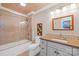 Functional bathroom featuring a vanity with a sink, glass-enclosed tub/shower, and neutral-toned decor for a clean and tidy space at 266 Riverwood Rd, Mooresville, NC 28117