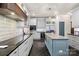 Spacious kitchen featuring a center island, custom cabinetry, and state-of-the-art appliances at 266 Riverwood Rd, Mooresville, NC 28117