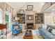 Cozy living room with a fireplace, built-in shelving, and comfortable seating, creating a welcoming atmosphere at 266 Riverwood Rd, Mooresville, NC 28117