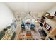 Sunlit living room featuring a cozy fireplace, hardwood floors, and elegant decor for comfortable living and entertaining at 266 Riverwood Rd, Mooresville, NC 28117