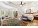 Spacious main bedroom with tray ceilings, plantation shutters, and ample natural light at 266 Riverwood Rd, Mooresville, NC 28117