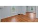 Bedroom with hardwood floors and neutral paint at 310 S Spencer Ave, Spencer, NC 28159
