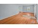 Bright living room with hardwood floors and a neutral color palette ready for personalization at 310 S Spencer Ave, Spencer, NC 28159