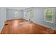 Bright living room with hardwood floors and natural light at 310 S Spencer Ave, Spencer, NC 28159
