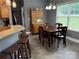 Dining area with tile floors, wooden dining table and china cabinet at 3110 Richards Way Dr, Rock Hill, SC 29732