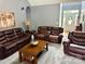 Cozy living room with comfortable leather furniture, carpet and plenty of seating at 3110 Richards Way Dr, Rock Hill, SC 29732