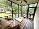 Comfortable screened porch with views of the fenced backyard at 3110 Richards Way Dr, Rock Hill, SC 29732