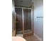 Beautiful tiled shower enclosure adds elegance to the updated bathroom space at 408 N Mcdowell St, Charlotte, NC 28204