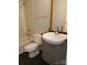 Updated bathroom with tile surround, modern fixtures, and neutral tones offers relaxation at 408 N Mcdowell St, Charlotte, NC 28204