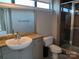 Spacious bathroom with granite counters, dual-flush toilet, and tiled shower at 408 N Mcdowell St, Charlotte, NC 28204