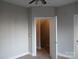 Cozy bedroom with neutral decor and recessed lighting is ready for personalization at 408 N Mcdowell St, Charlotte, NC 28204