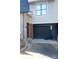 Exterior shot of home showing the garage and private entrance at 408 N Mcdowell St, Charlotte, NC 28204
