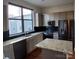 Modern kitchen featuring stainless steel appliances, granite countertops and backsplash at 408 N Mcdowell St, Charlotte, NC 28204