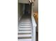Bright staircase features hardwood treads, white risers, and modern metal light fixtures at 408 N Mcdowell St, Charlotte, NC 28204
