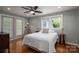 Bright bedroom with hardwood floors, large windows, and neutral color scheme at 409 S Grove St, Lincolnton, NC 28092