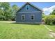 Well-maintained exterior showcases manicured lawn and access steps at 409 S Grove St, Lincolnton, NC 28092