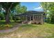 Charming craftsman-style home with a welcoming front porch and beautifully landscaped yard at 409 S Grove St, Lincolnton, NC 28092