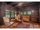 Cozy living room with hardwood floors, classic furniture, and bright natural light at 409 S Grove St, Lincolnton, NC 28092