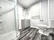 Contemporary bathroom featuring a walk-in shower, modern vanity, and stylish fixtures at 423 N Cedar St, Lincolnton, NC 28092
