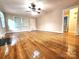 Open-concept living room with hardwood floors and abundant natural light perfect for relaxation at 423 N Cedar St, Lincolnton, NC 28092